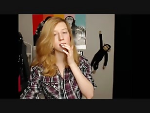 18 year old teen takes off her red bra and shows off her delicious big tits.